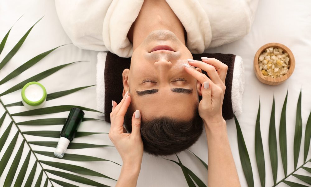 Man receiving face massage in beauty salon at The Best Injector